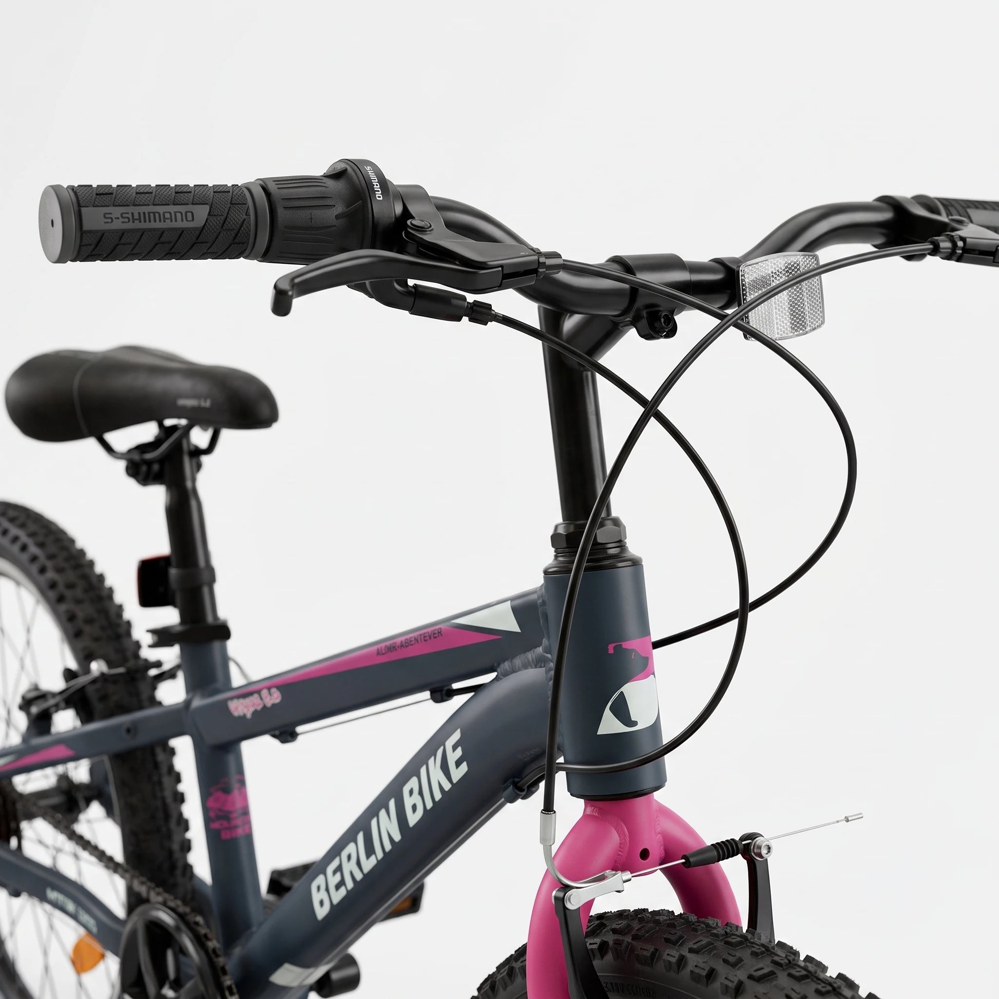 Berlin Bike Grizz Kids Mountain Bike 20 Inch front view showing handlebar and saddle pink